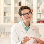 Pharmacist Talking to Senior Woman