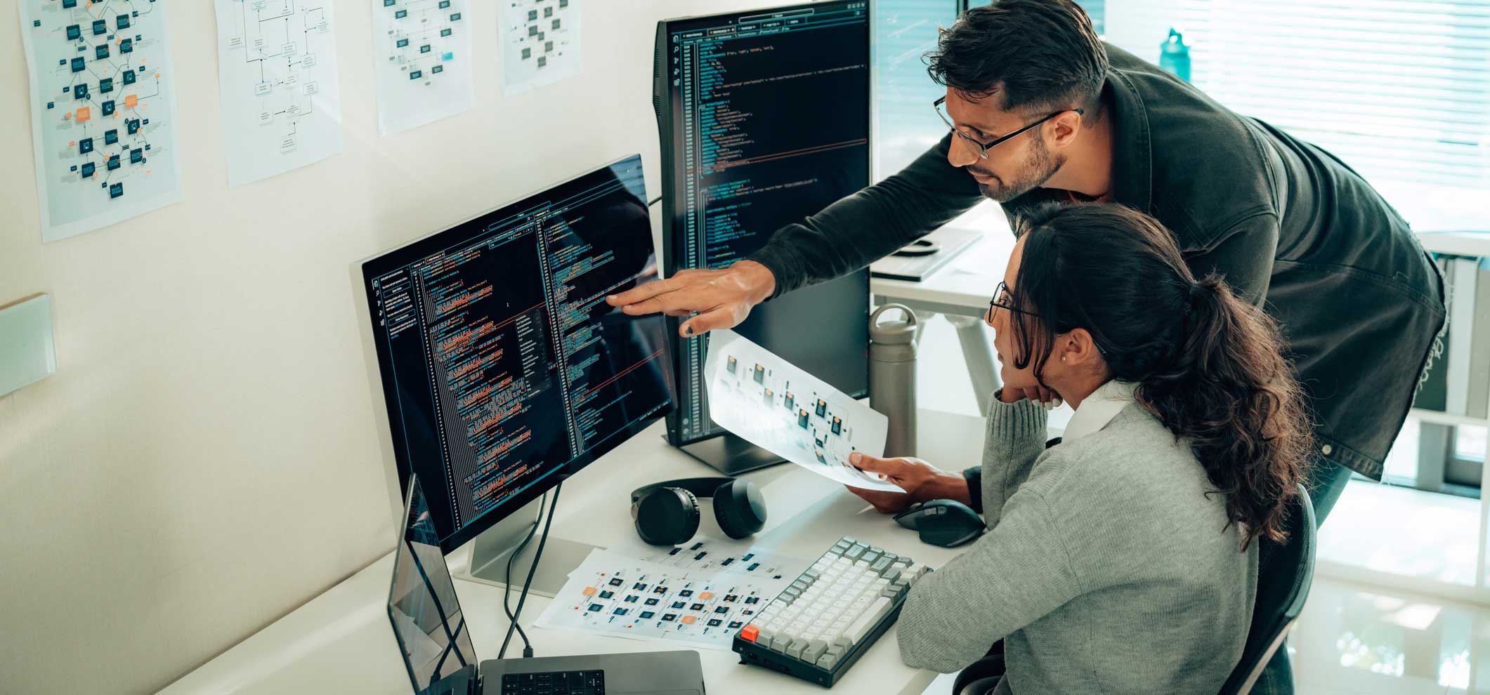 Hispanic Programmers Collaborating on Software Development in a Modern Office Setting